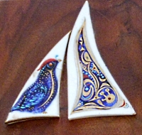 fragments in shape of sails